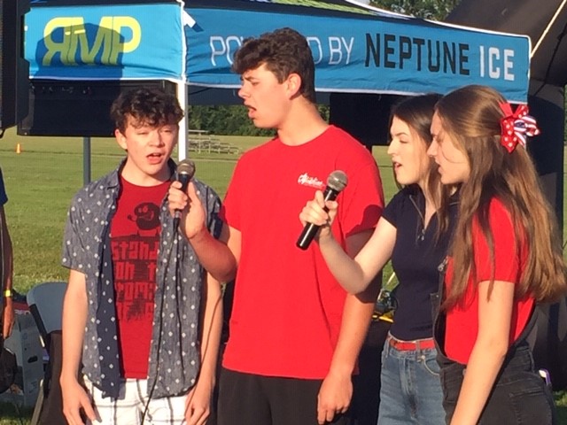 A quartet from Greenwood High School sings the National Anthem as part of opening ceremonies for the Freedom Run.